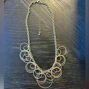 Gold tone hoop dangle interlacing statement necklace